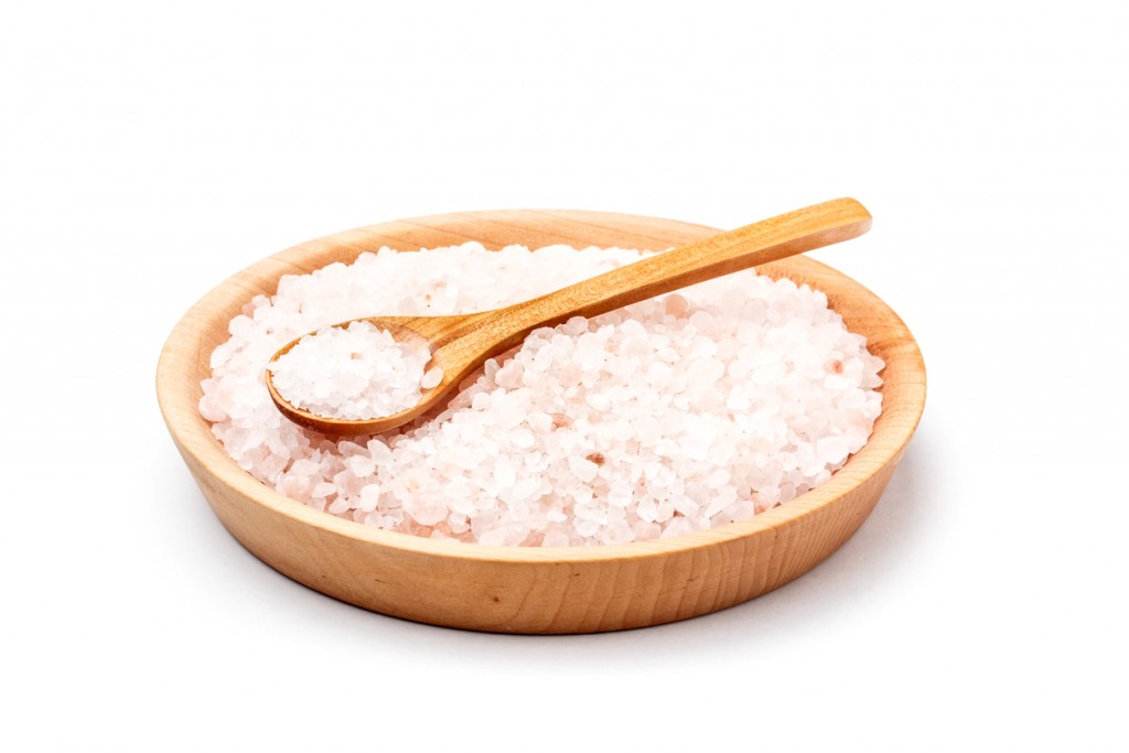 Pink salt from the Himalayas in wooden bowl